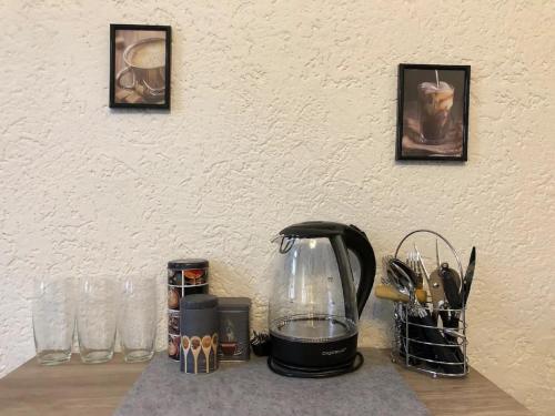 a blender sitting on top of a table at Gästezimmer zur Brücke in Zwiesel