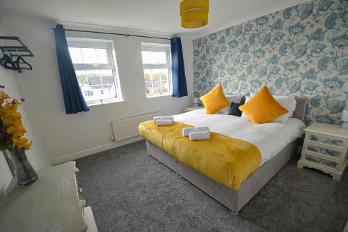 Huntsfield House- Stunning Modern 4 Bedroom House Suitable for Work and Leisure Staysにあるベッド