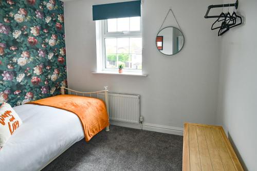 Huntsfield House- Stunning Modern 4 Bedroom House Suitable for Work and Leisure Staysにあるベッド