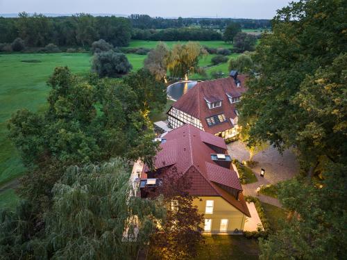 an overhead view of a large house with a roof at SCHLOSSRESIDENZ - Boutique Apartments & Hotel Suiten in Schloß Ricklingen