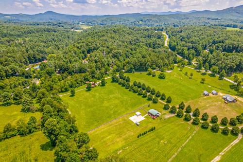 an aerial view of a field with trees at Lil Yellowstone in Morganton
