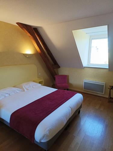 Postel nebo postele na pokoji v ubytování Hôtel La Reconce