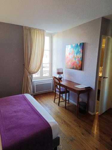 Postel nebo postele na pokoji v ubytování Hôtel La Reconce