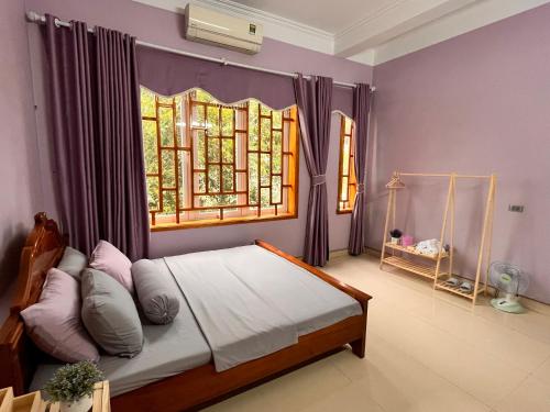 Giường trong phòng chung tại Na Tuệ An-Homestay