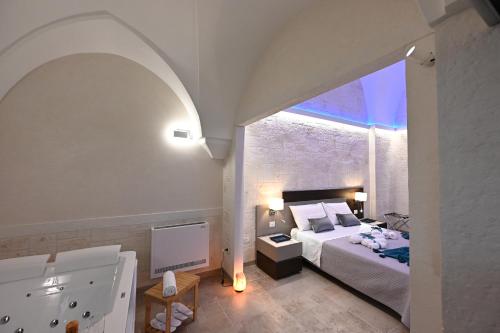 Postel nebo postele na pokoji v ubytování Suite Laurel SPA con idromassaggio