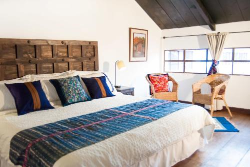 Postel nebo postele na pokoji v ubytování Villas de la Ermita