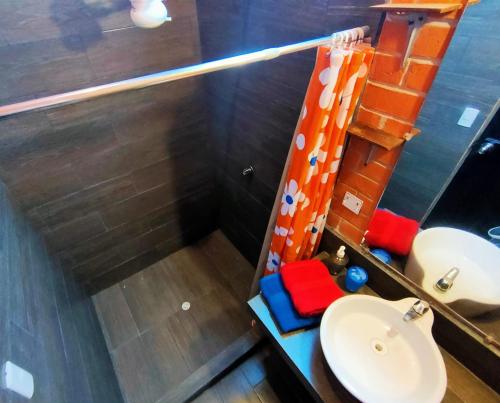 a bathroom with a toilet and a sink at Vistamar 100m2 departamento in Puerto López