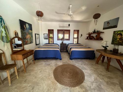 Ein Bett oder Betten in einem Zimmer der Unterkunft Casa Tom Tom - Adults Only