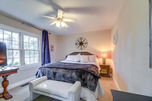 a bedroom with a bed and a ceiling fan at Idyllic and Central New Bern Home with Screened Porch! in New Bern