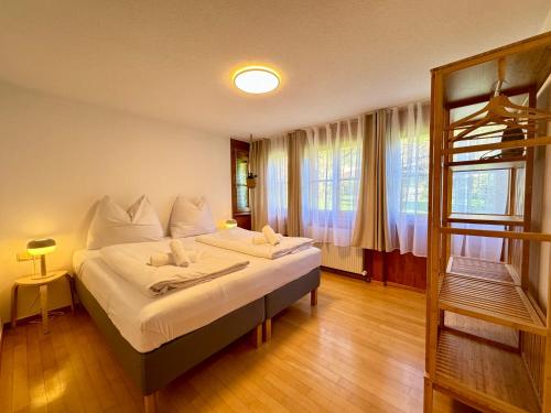 Una cama o camas en una habitación de Bauernchalet Alois