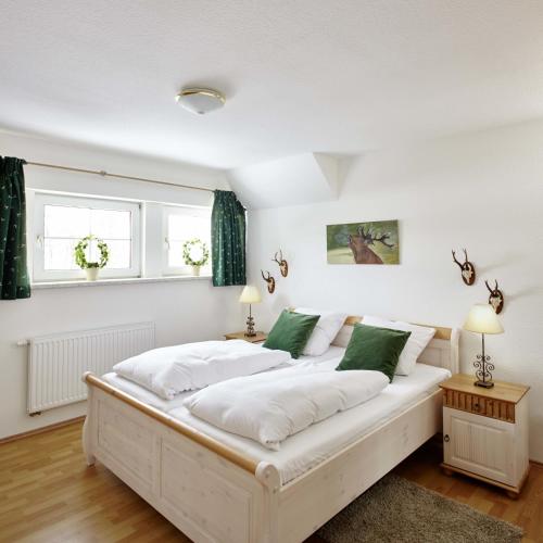 Cama o camas de una habitación en Hotel Hof Tütsberg