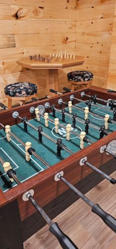a group of billiard tables in a room at GameRoom, HotTub, Piano, 5mi to OldManCave - Hocking Hills Copper House in Laurelville