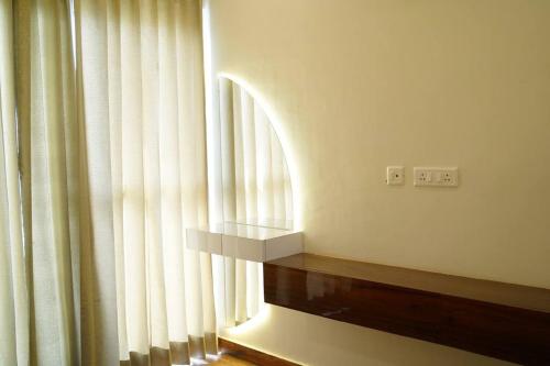 Harmony Haven - Luxurious 3 BHK Haven for Allにあるベッド