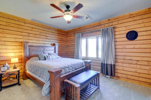 a bedroom with a bed and a ceiling fan at Large Deck and Mountain Views Prescott Getaway! in Prescott