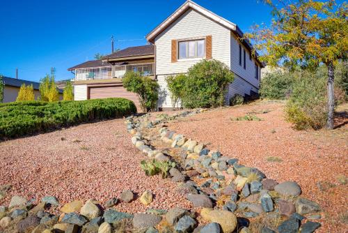 a house with a stone path in front of a house at Large Deck and Mountain Views Prescott Getaway! in Prescott