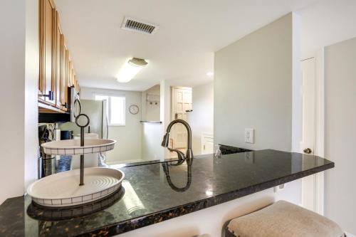 a kitchen with a counter top with a sink at St Augustine Oasis Community Pool and Private Patio in Saint Augustine