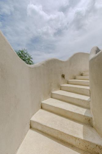 a set of concrete stairs with a sky in the background at Casa Caracola in Tubará