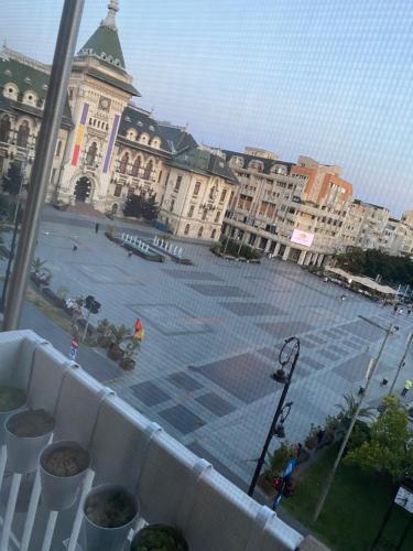 a view from a balcony of a large building at Black&White Studio Ultracentral in Craiova