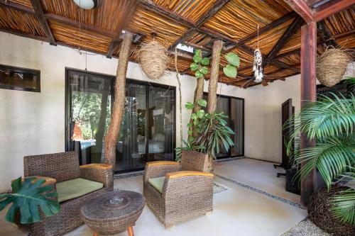 Χώρος καθιστικού στο Trece Lunas Tulum - Enchanted Resort