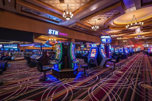 a casino filled with lots of slot machines at Santa Fe Station Hotel & Casino in Las Vegas