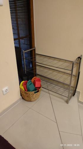 a basket of balls sitting on the floor in a room at Villa Homestay Nad Helmrovkou in Prague