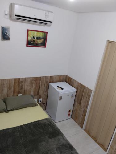Postel nebo postele na pokoji v ubytování HORTA DO TOMATE