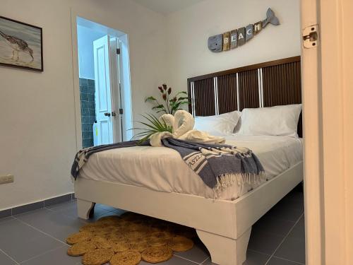 Postel nebo postele na pokoji v ubytování EL TOUCAN, Apartament in bayahibe