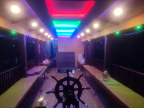a room with a large room with a boat in it at Spice coast cruise in Kokkānisseri