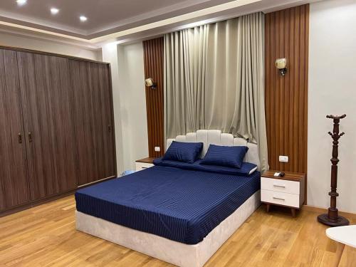 The Royal Apartment at New Cairo الشقة الملكية بالقاهره الجديدةにあるベッド