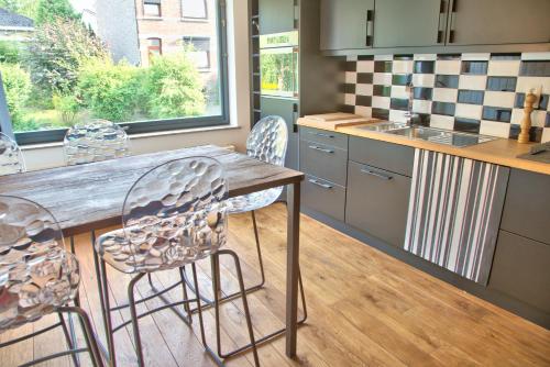 Kuchyň nebo kuchyňský kout v ubytování Le Dépôt