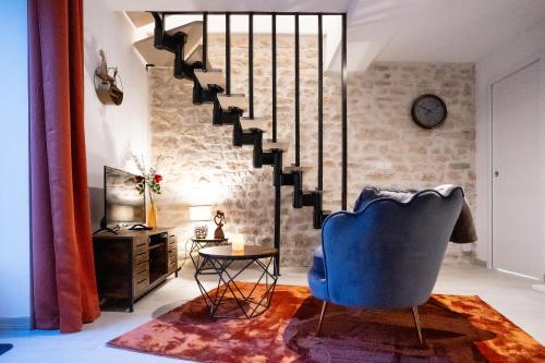 Χώρος καθιστικού στο Love Room Une Pause à Deux - Jacuzzi - Chambre Secrète