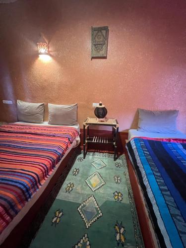 Ένα ή περισσότερα κρεβάτια σε δωμάτιο στο Auberge Ksar Ait Ben Haddou
