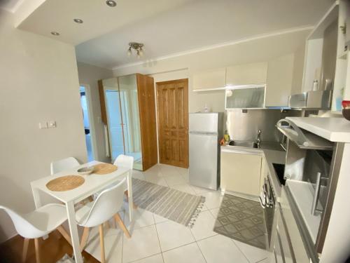 A kitchen or kitchenette at Guest-home 2