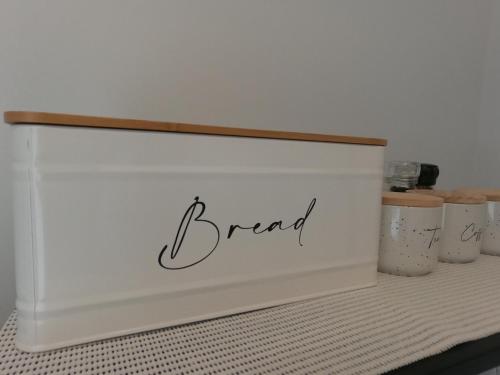 a white wall with the word brand written on it at Berryfields 64 in Appleby