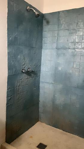 Ванная комната в HOTEL REVOLUCION