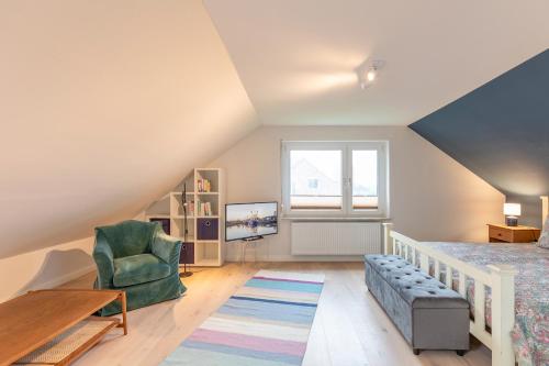 Ruang duduk di Ferienhaus Deichglück