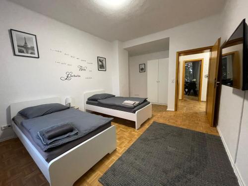 Katil atau katil-katil dalam bilik di Ruhrpott Apartment Zentral