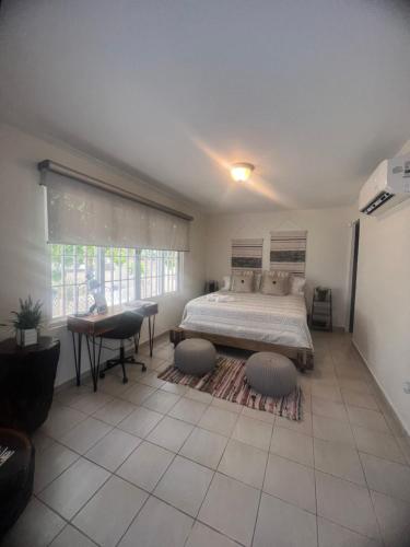 Postel nebo postele na pokoji v ubytování Aquamar Oceanfront Suite