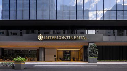 an office building with a sign that reads international at InterContinental Singapore Robertson Quay by IHG in Singapore