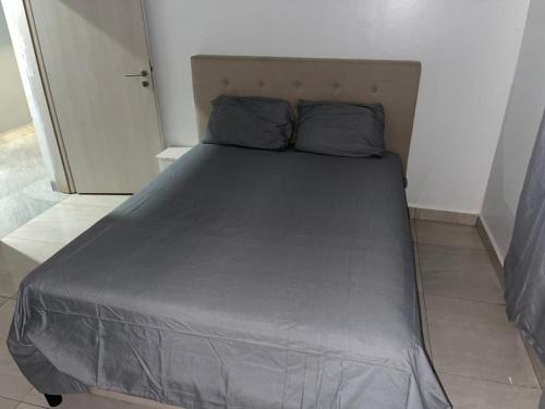 Ένα ή περισσότερα κρεβάτια σε δωμάτιο στο Dream Stay