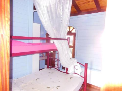Postel nebo postele na pokoji v ubytování maison située dans un petit village de pecheur