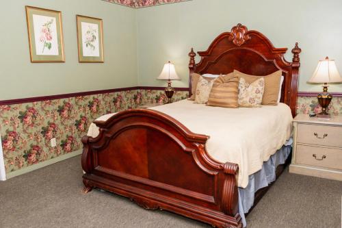 Ένα ή περισσότερα κρεβάτια σε δωμάτιο στο Gunn House Hotel