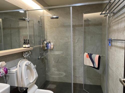 Ein Badezimmer in der Unterkunft 浮雲投影海景溫泉