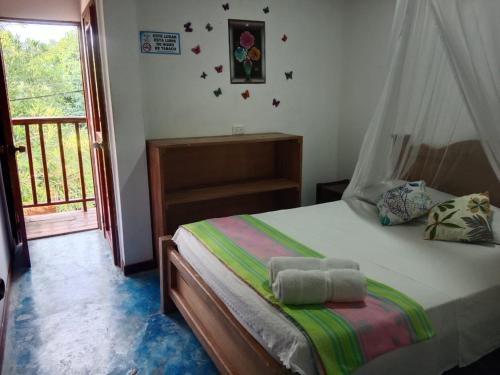 Voodi või voodid majutusasutuse Hostel Blue Sea Rincon del Mar toas