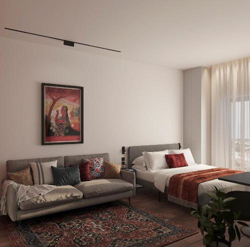 uma sala de estar com uma cama e um sofá em Cosy apartment with balcony I Blueloft 65 em Tashkent