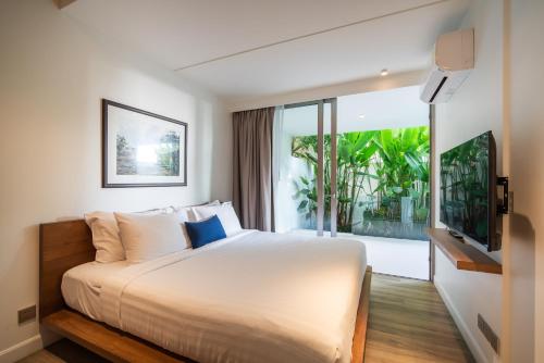 Postel nebo postele na pokoji v ubytování Phuket Seaside Villa 2