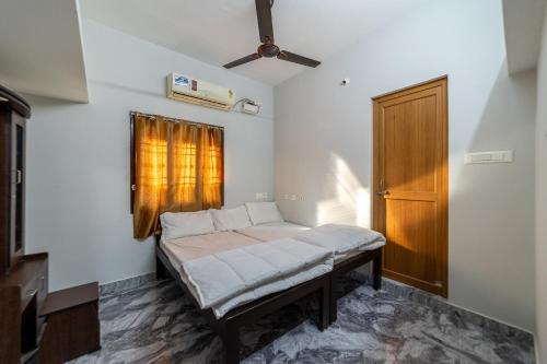 מיטה או מיטות בחדר ב-Villa Bonne Esperance
