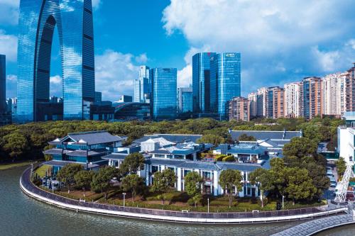 an aerial view of a city with tall buildings at Tonino Lamborghini Hotel Suzhou in Suzhou