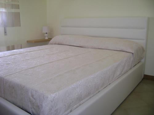 Voodi või voodid majutusasutuse Torrebianca toas
