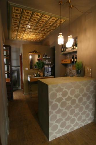 a kitchen with a counter top in a room at La Rocca Guest House & Spa in Montefalco